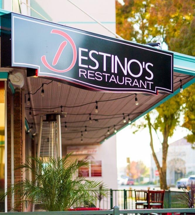 Destino's storefront sign